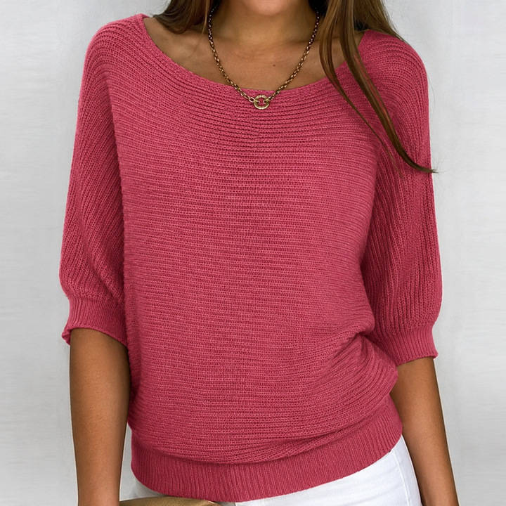 Relaxed women's 3/4 sleeve knit top. Versatile pullover sweater, perfect for fall, winter, or spring outfits.