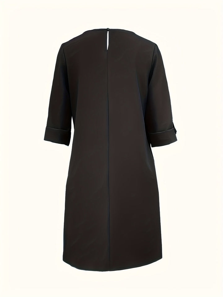 Women's office attire midi dress. Effortless comfort and elegant design, perfect with its rounded neck and 3/4 sleeves.