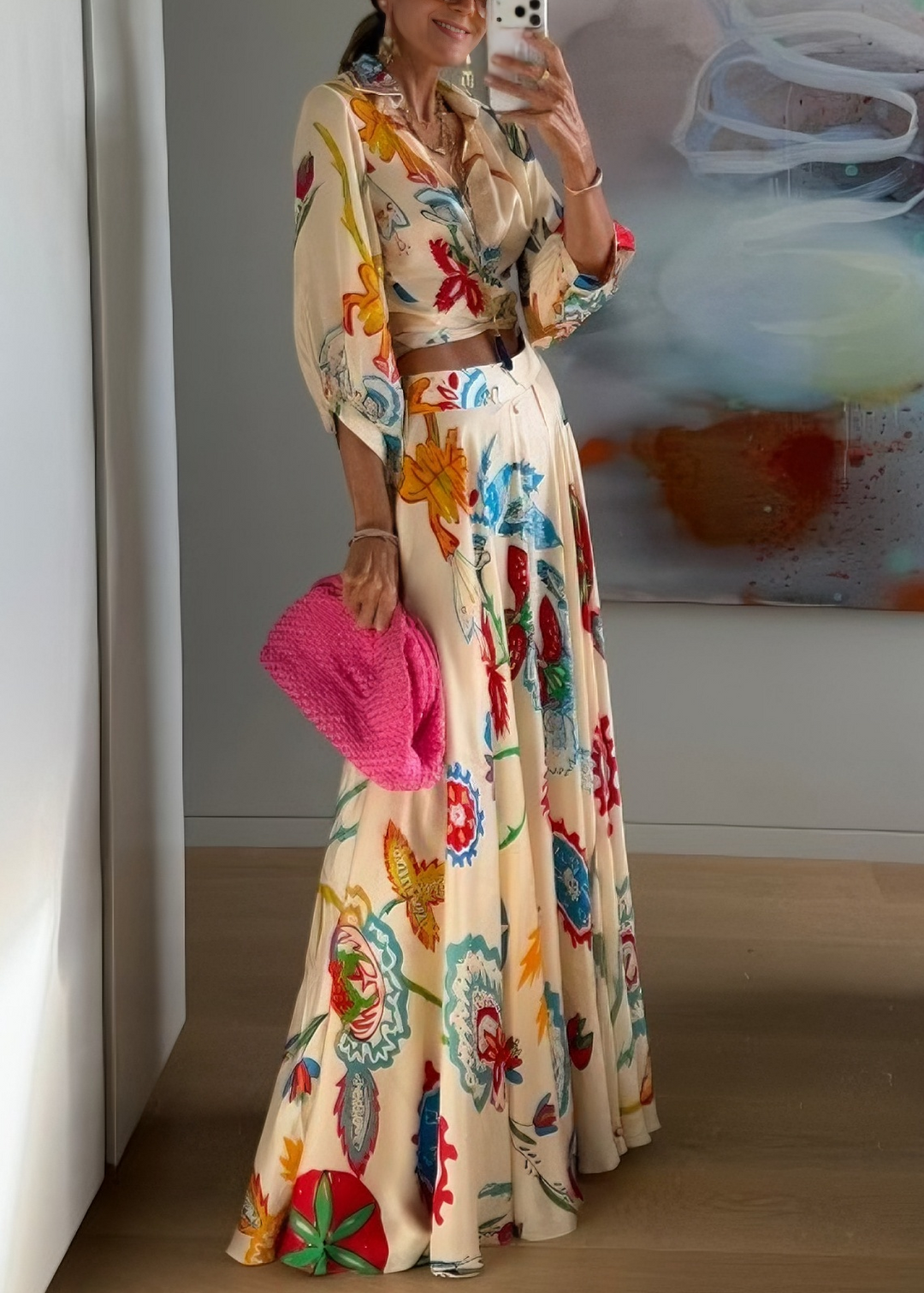 Vacation-ready women's beige floral two-piece set: a chic tie-front top and a comfortable maxi skirt.