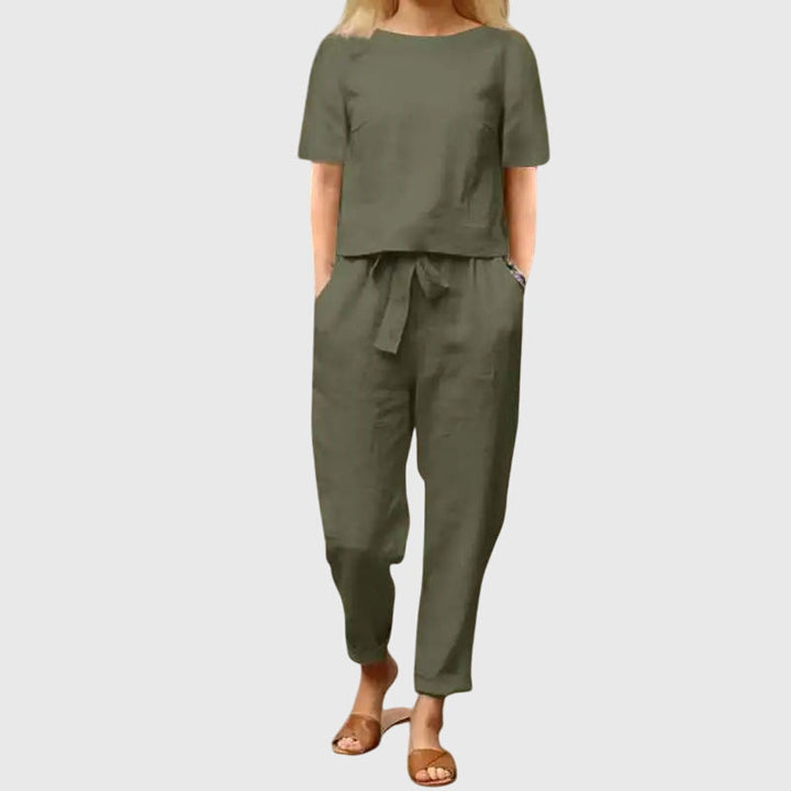 Effortless women's belted crop top & high-waisted trouser set, a stylish and comfortable two-piece for spring.