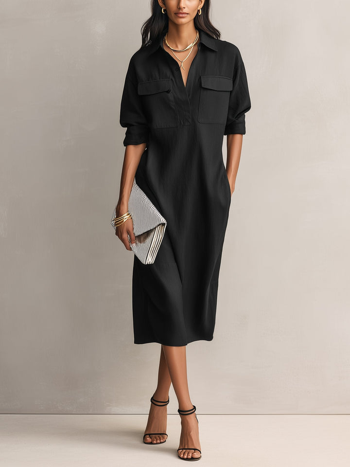 Women's effortless black collared midi shirt dress with elbow sleeves and relaxed fit, perfect for casual or office wear.