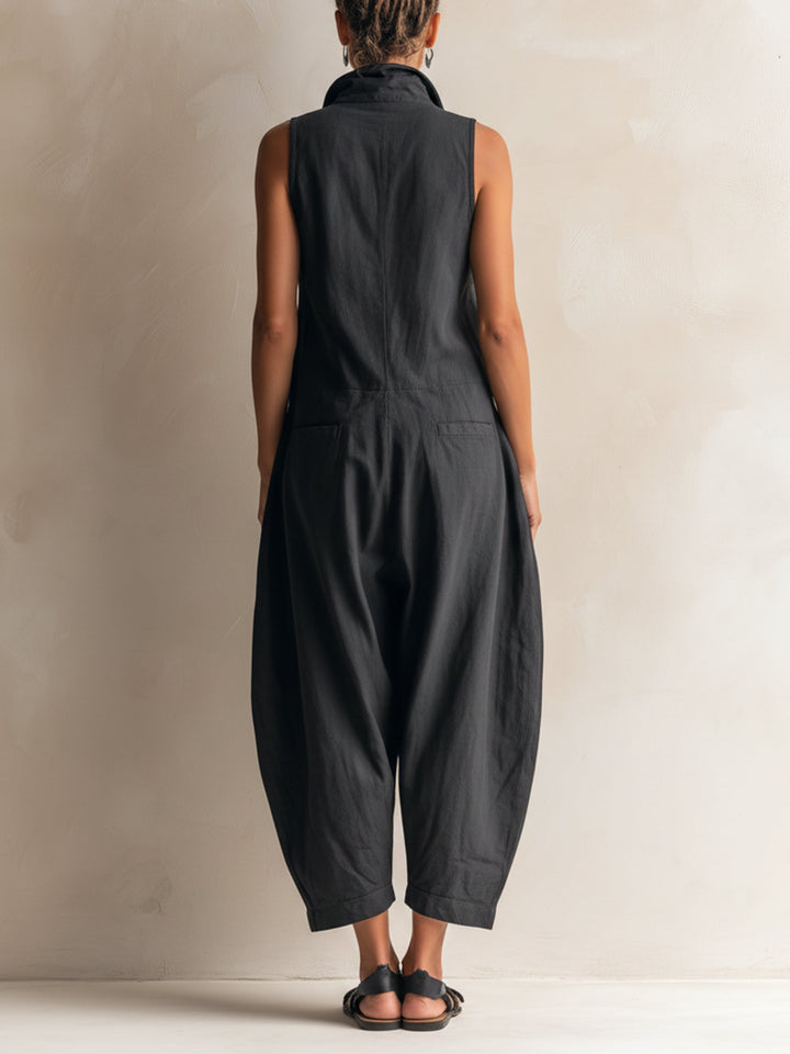 Chic black sleeveless collared jumpsuit for women, featuring a comfortable wide leg design. Versatile fashion.