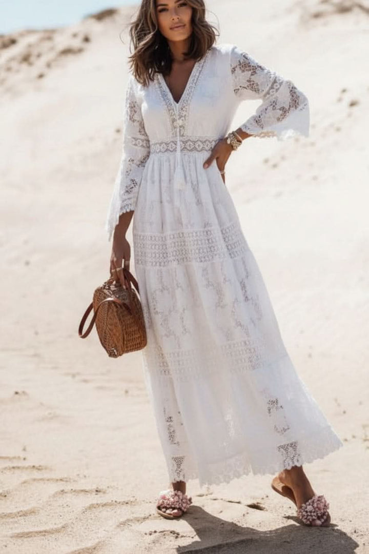 Flowy bohemian maxi dress for women, with a V-neck, ideal for beach, vacation, or elegant summer outings.
