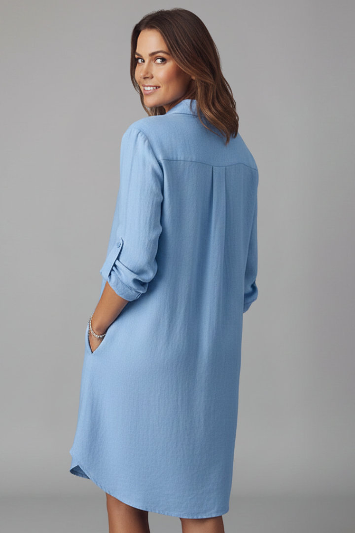 Versatile women's button-front shirt dress with turned collar & long sleeves, great for casual or office wear.