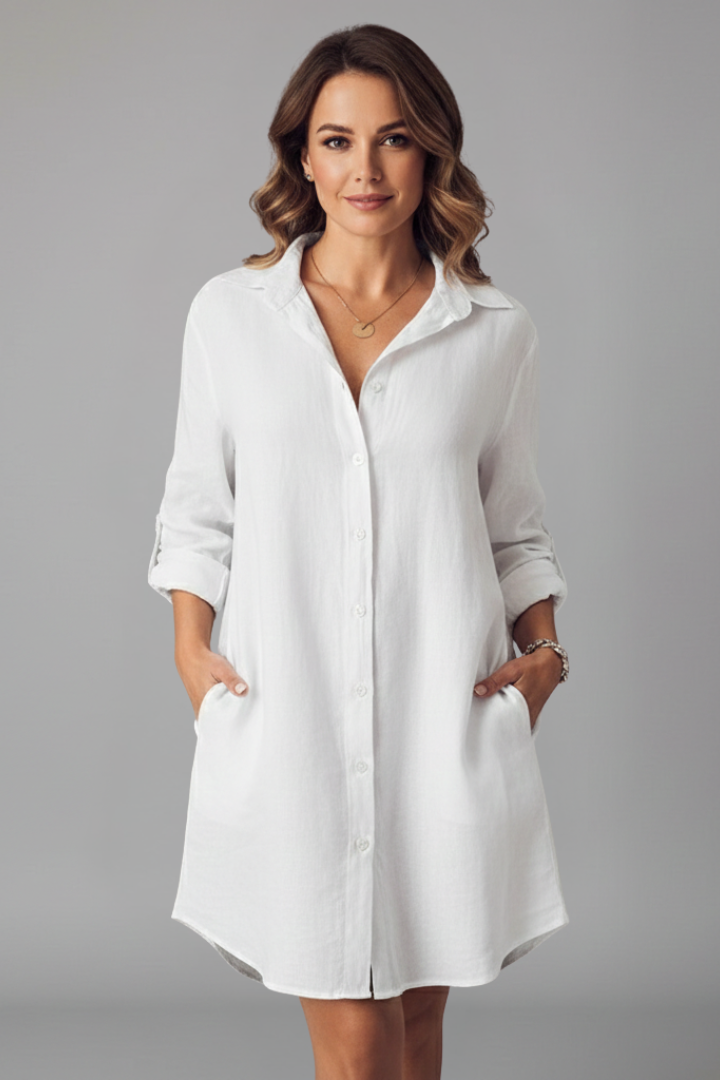 Elegant women's shirt dress featuring a full button-front and sophisticated turned collar, suitable for any occasion.