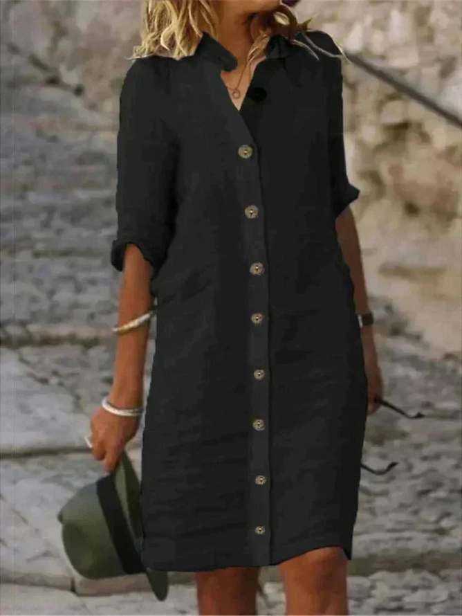 Relaxed fit collared button-down shirt dress for women. Ideal casual day dress with a chic, comfortable style.