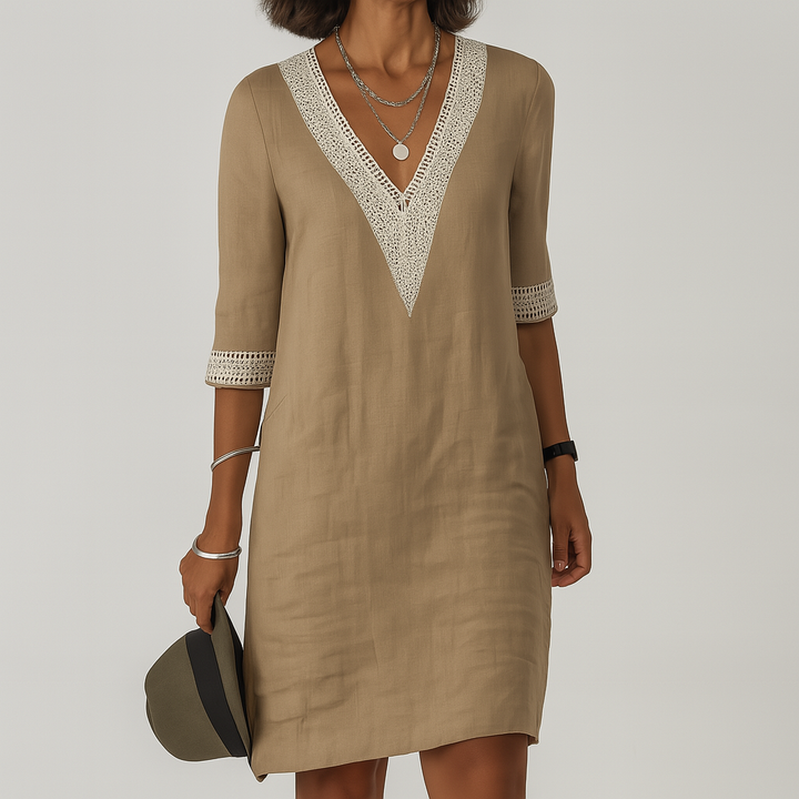 Women's effortless chic summer midi dress, relaxed fit, perfect for casual elegance or vacation wear.