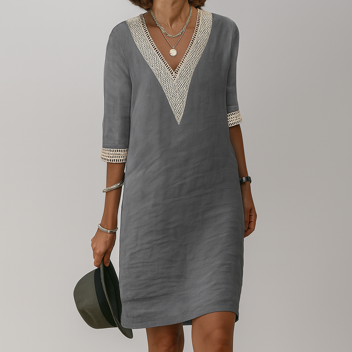 Elegant women's sleeveless midi dress for summer, relaxed style, versatile for casual wear or vacation.