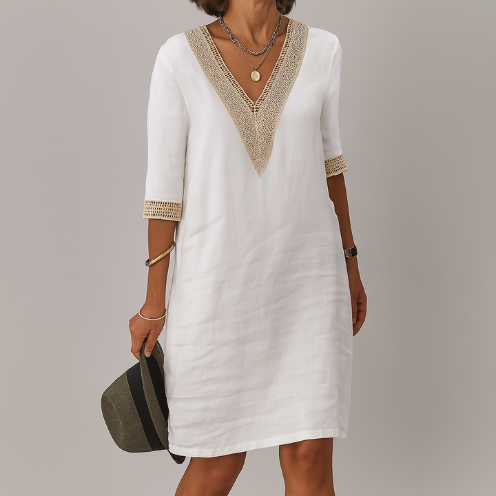 Stylish women's summer midi dress with a relaxed fit, sleeveless design, perfect for effortless spring chic.