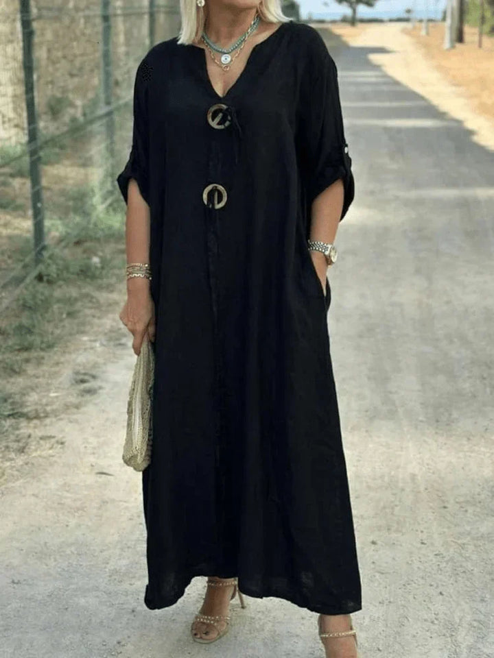 Grey flowy tunic dress for women. This comfortable, relaxed fit dress is perfect for casual chic summer styling.