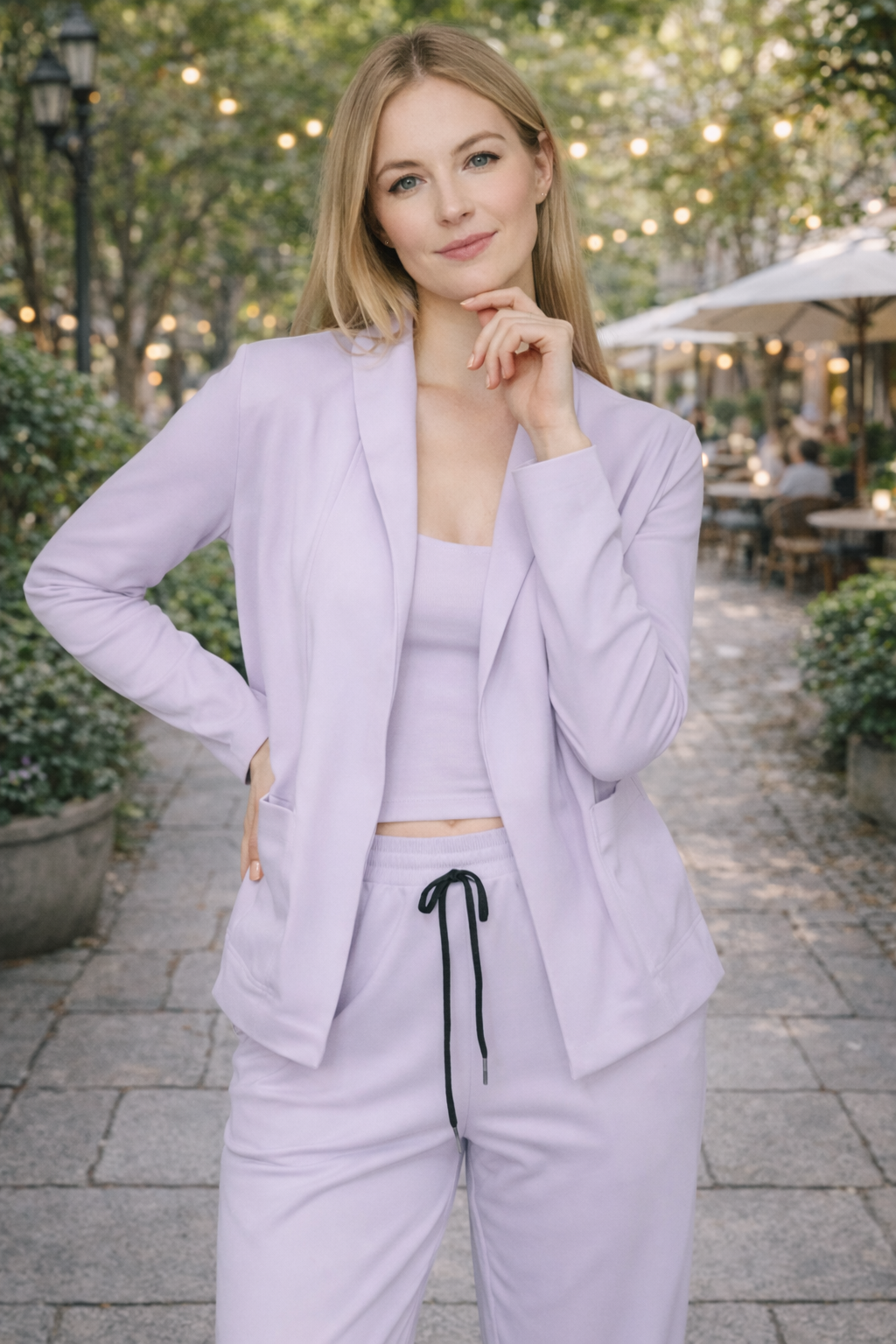 Back view of the women's chic two-piece suit set. Modern, comfortable blazer & pants for stylish professional wear.