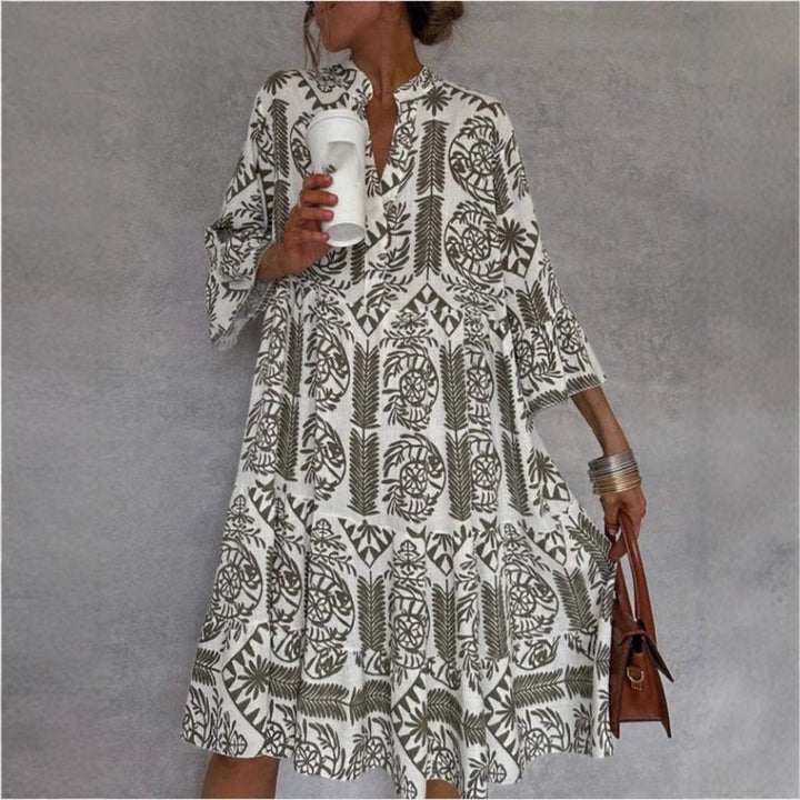 Breezy floral print tiered sundress for women, showcasing a relaxed boho style, ideal for summer.