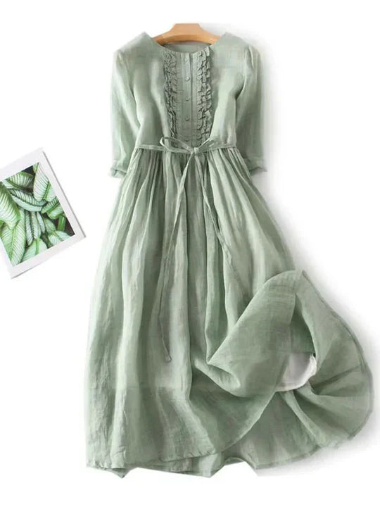 New elegant women's flowy midi summer dress. Sleeveless and airy, ideal for comfortable casual or vacation style.
