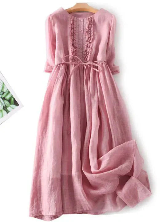 Versatile women's flowy sleeveless midi dress. Comfortable and airy summer style for casual, spring, or vacation outfits.