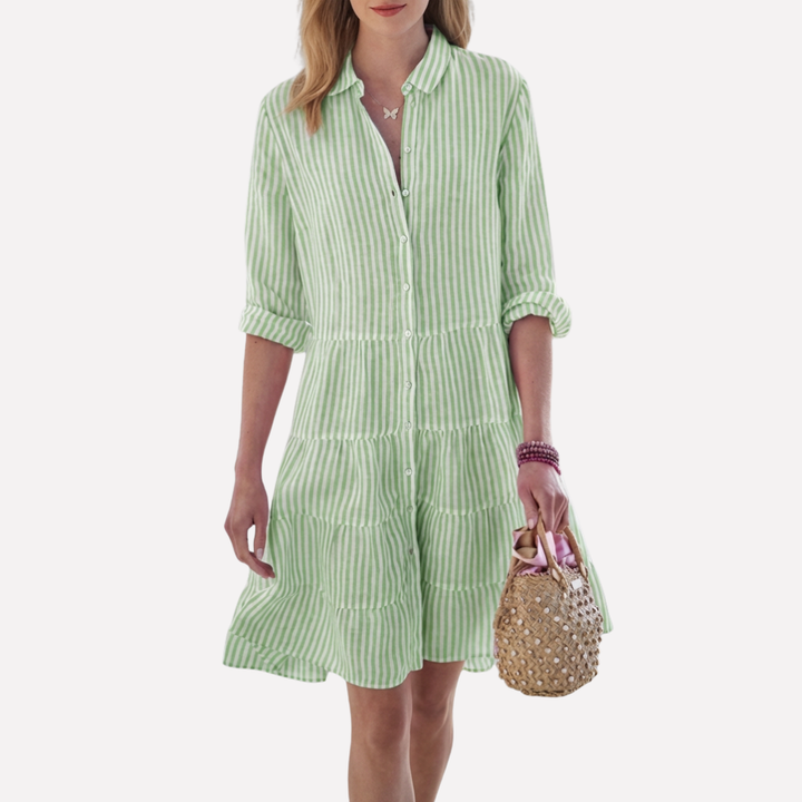 Model in a comfortable sleeveless flowy midi dress, ideal for summer casual wear, beach, or resort.