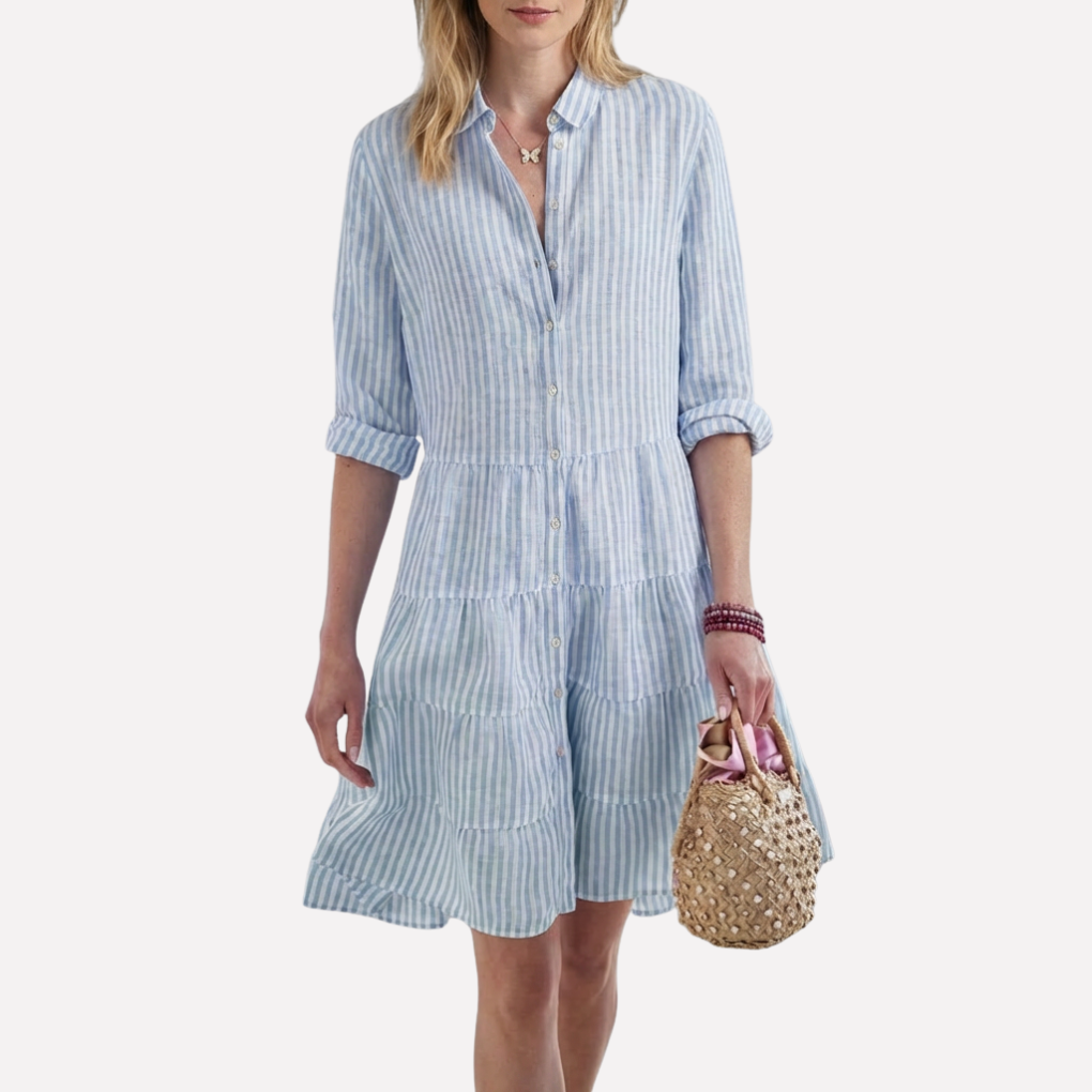 Back view of a women's sleeveless flowy midi dress, a comfortable and chic option for summer vacation.
