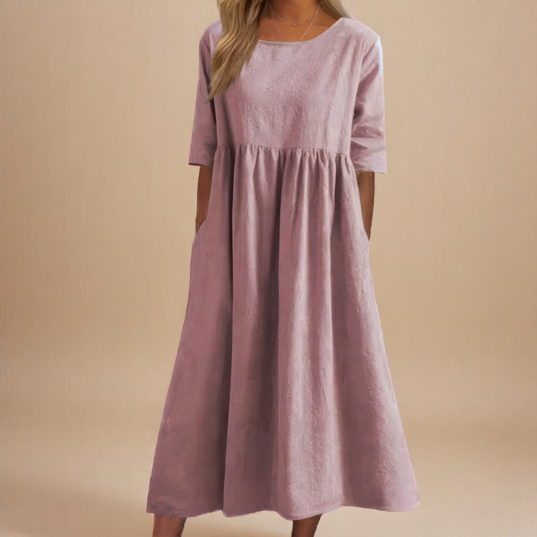 Women's casual midi dress with half sleeves, a gathered waist, scoop neck. Perfect everyday summer dress.