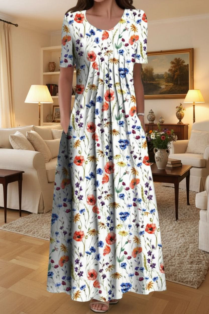 Stylish women's knee-length floral dress. Effortless, versatile, everyday casual wear with functional pockets.