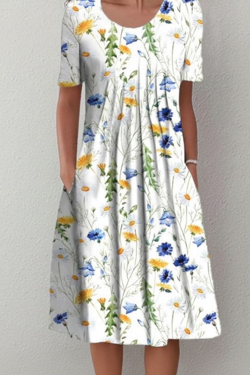 Easy slip-on women's knee-length floral dress. Everyday casual summer style, comfortable and with pockets.