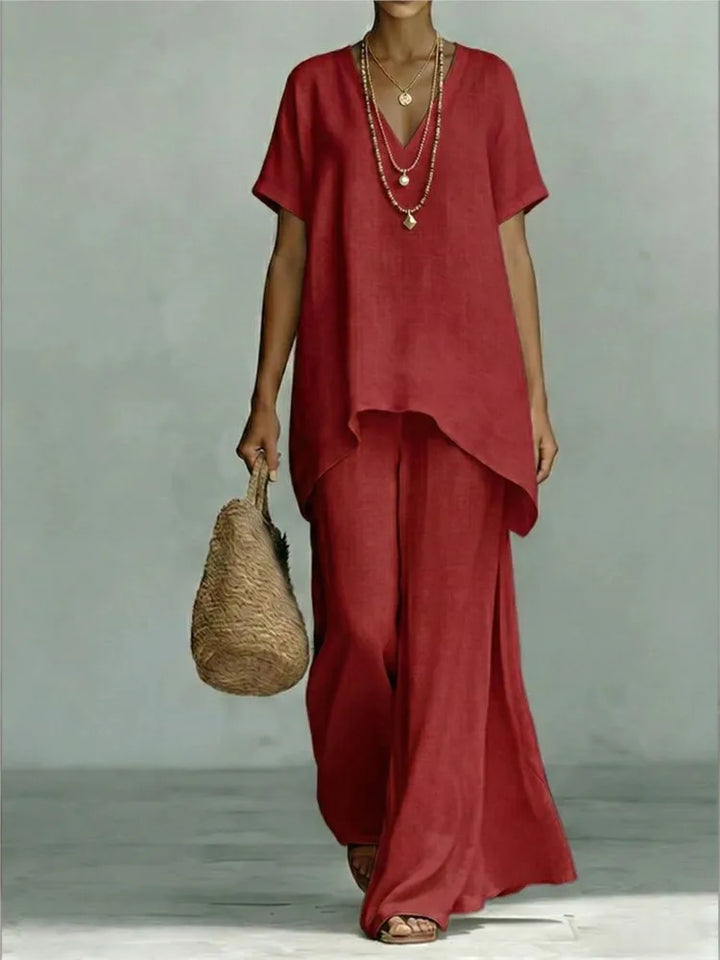 Women's linen blend two-piece with a chic asymmetrical pullover top & wide-leg pants.
