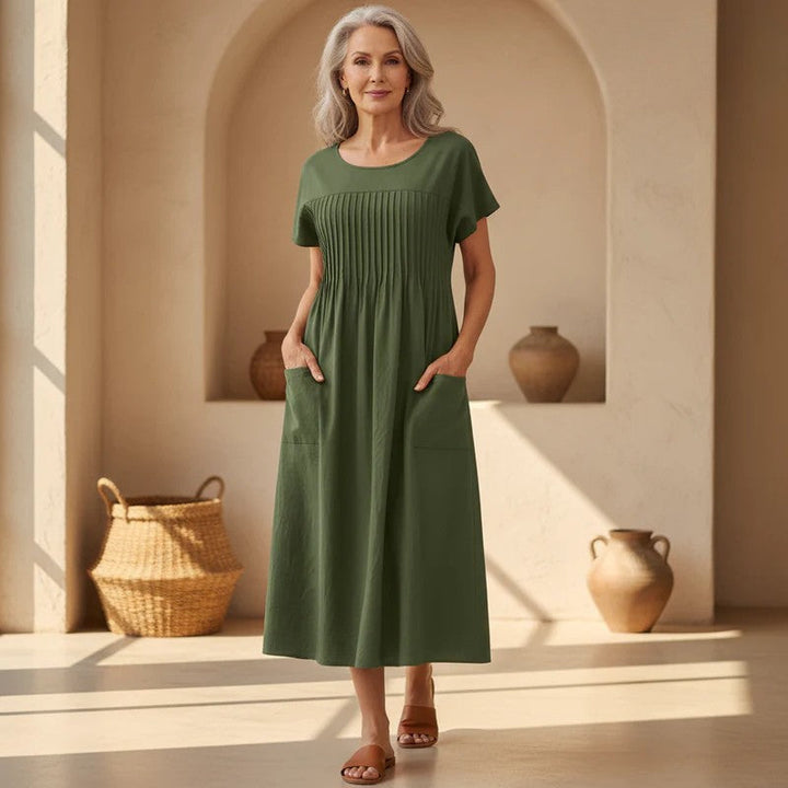 Women's effortless pleated midi dress, relaxed fit, perfect for casual everyday wear & comfort.