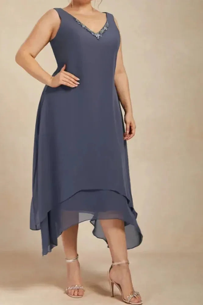 Effortless women's printed flowy midi dress. Versatile for day, evening, or garden party; comfortable & stylish.