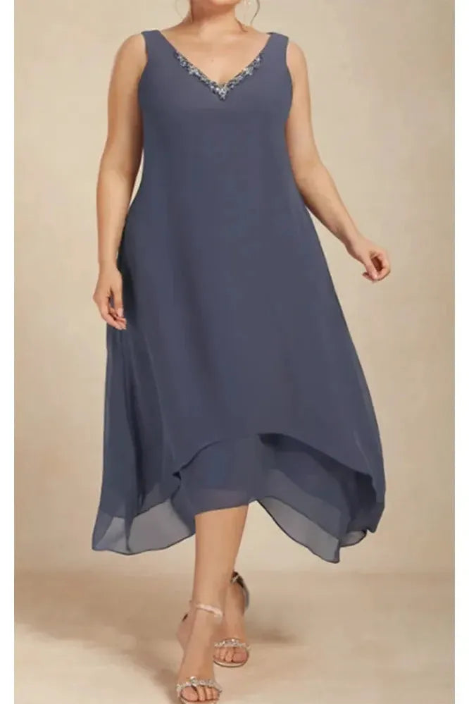 Elegant printed flowy midi dress for women. Soft fabric, relaxed fit, perfect for comfortable spring & summer style.