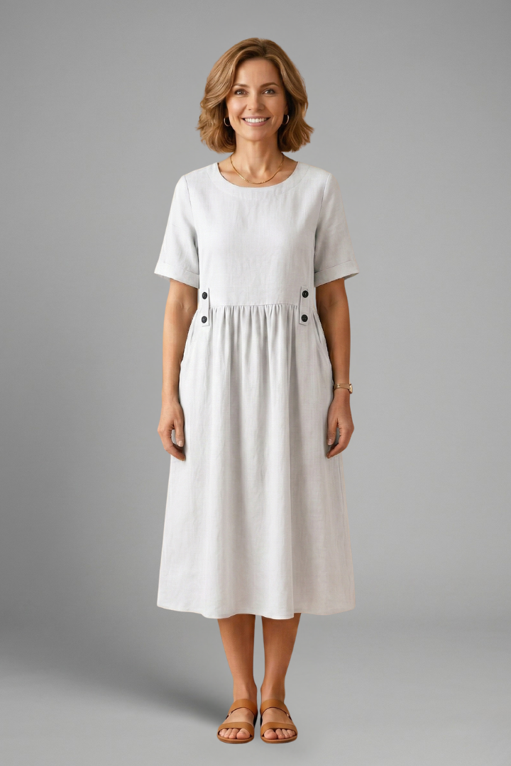 Comfortable loose fit women's midi dress with a round neck, ideal for everyday casual wear.
