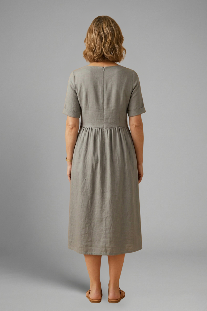 Summer-ready women's midi dress, round neck, loose fit, and short sleeves for cool, casual comfort.