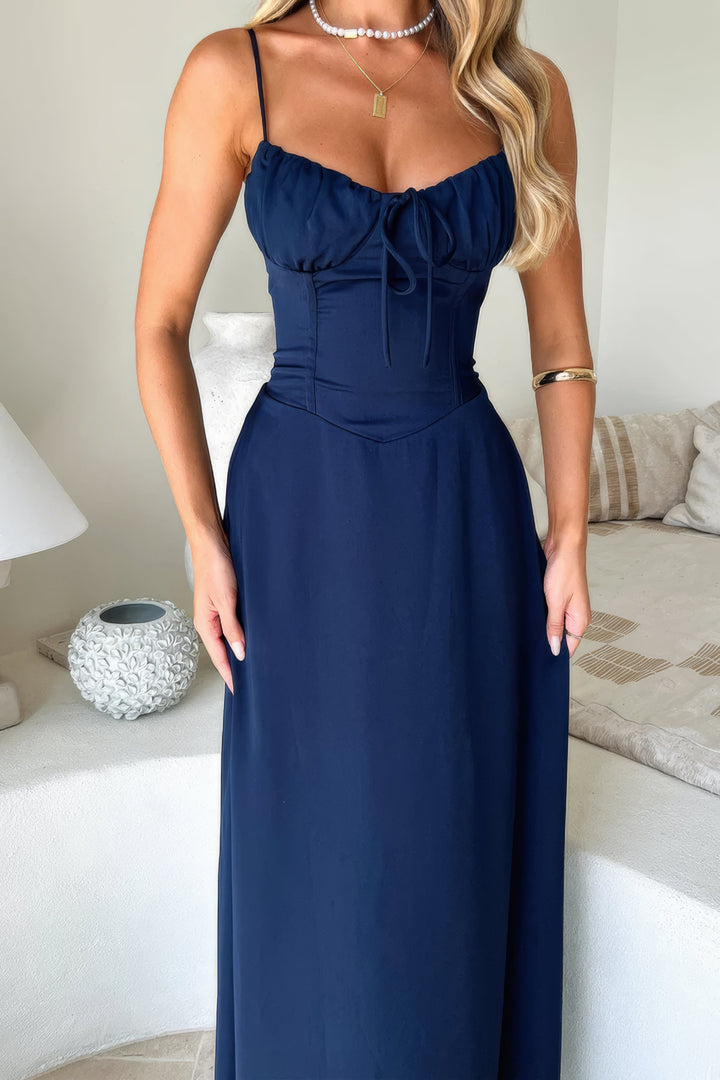 Back detail of an elegant sleeveless A-line maxi dress for women, chic summer style.