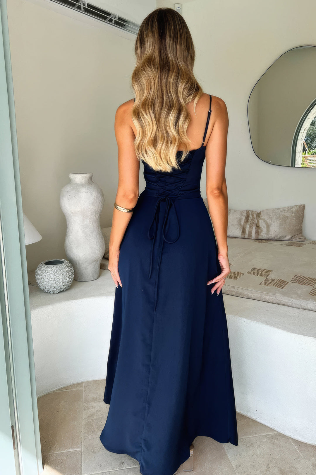 Women enjoying summer in an effortless sleeveless A-line maxi dress, ultimate comfort & style.