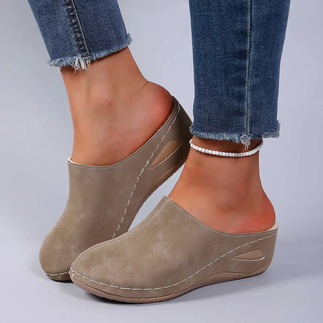 Versatile women's comfort clogs, slip-on design for easy, cushioned everyday indoor-outdoor wear.