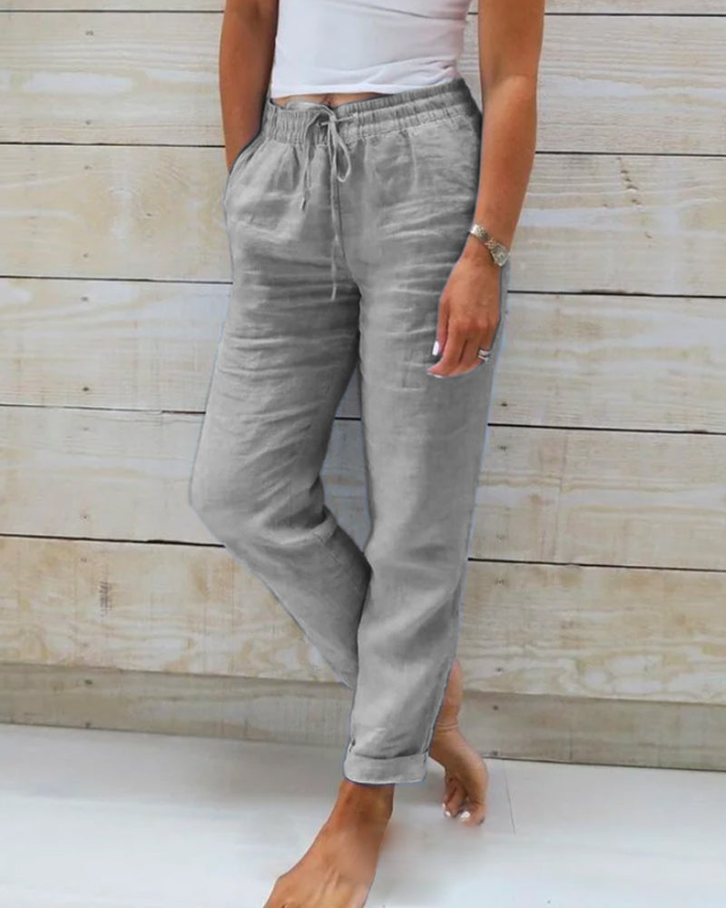 Casual women's straight leg drawstring pants. Ideal for summer style, beach, vacation, and comfortable wear.