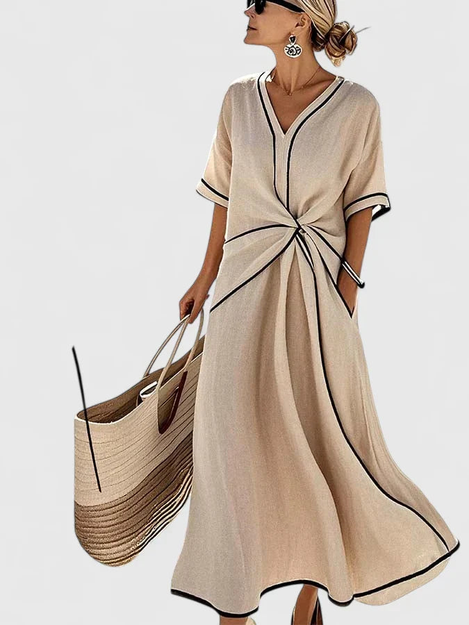 Modern women's flowy striped midi dress, ideal for daily wear. Comfortable, breathable, and chic summer style.