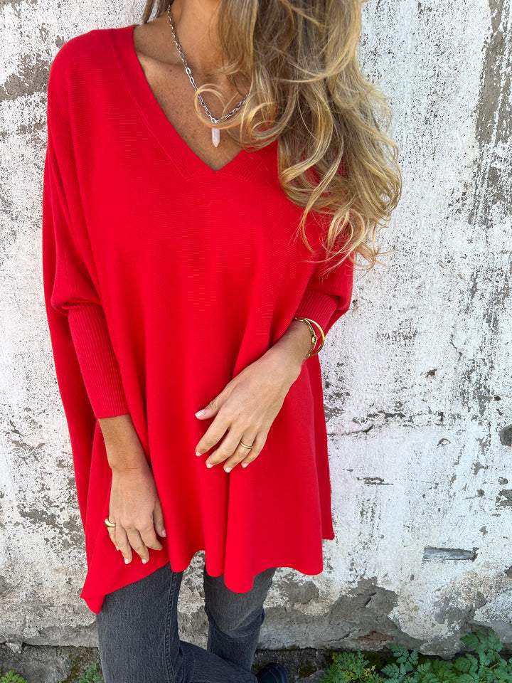 Women's V-neck, long sleeve swing tunic pullover sweater. Casual, comfortable, versatile fashion for effortless wear.