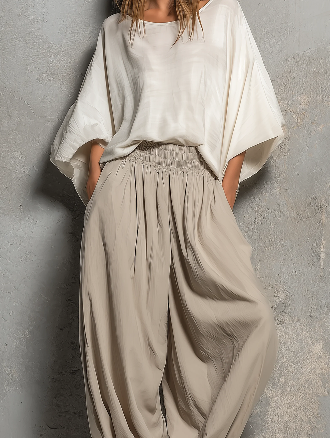 Comfortable taupe wide leg harem pants for women, featuring a drawstring waist, great for travel & casual spring wear.