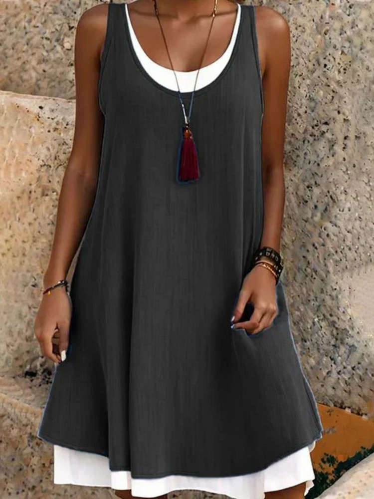 Women's effortless two-layer scoop neck midi dress in a comfortable A-line cut, perfect for summer casual wear.