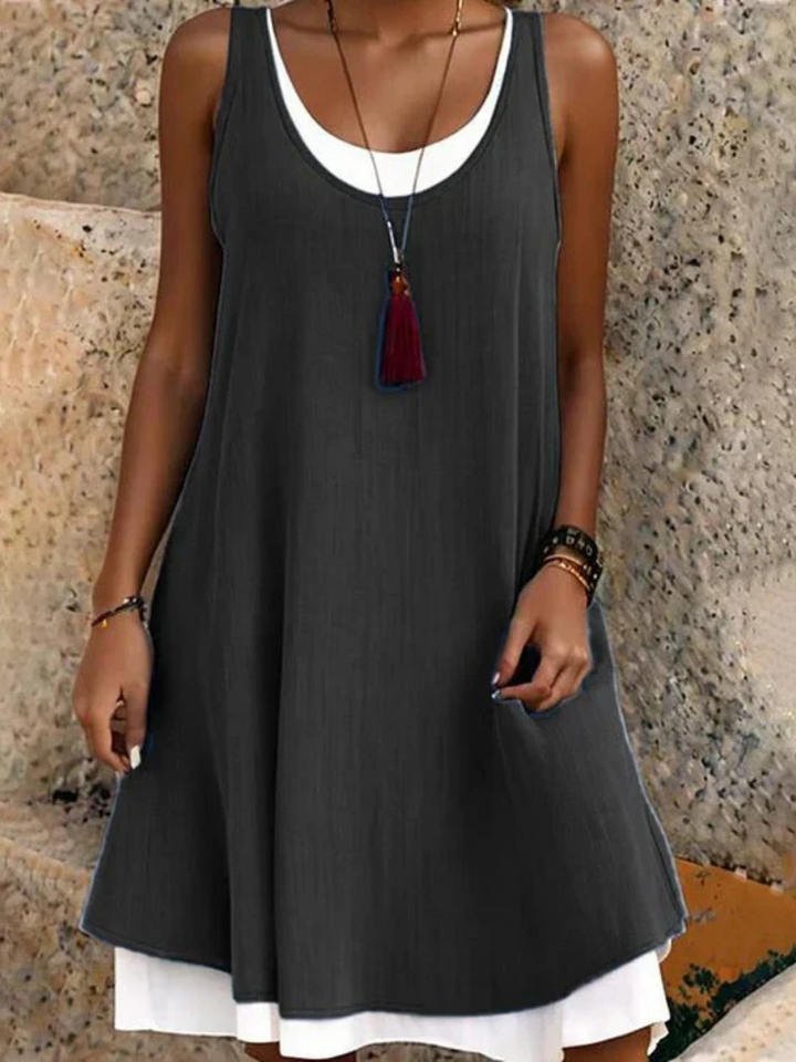 Women's effortless two-layer scoop neck midi dress in a comfortable A-line cut, perfect for summer casual wear.