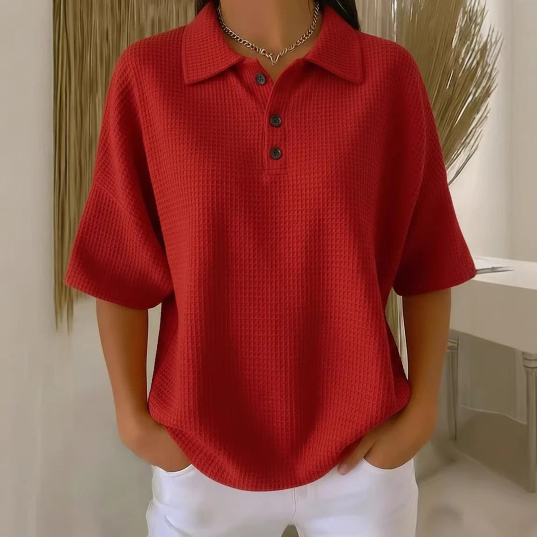 Trendy women's waffle knit polo blouse, loose fit, short sleeve, perfect for a comfortable everyday look.