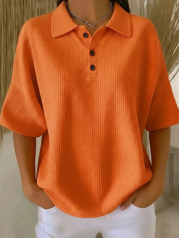 Women's casual short sleeve polo blouse in waffle knit, featuring a comfortable loose fit and button neck.