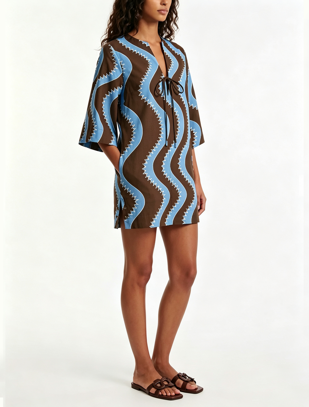 Stylish women's wave print mini dress with a collared neck, elbow sleeves, ideal for vacation outfits.
