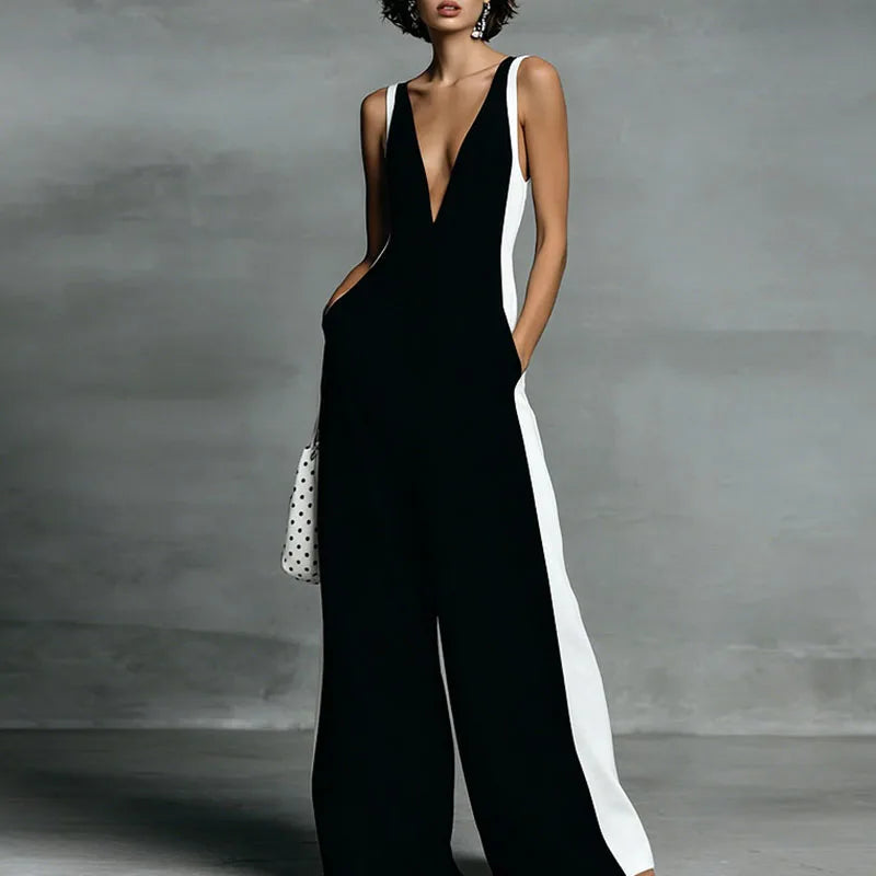 Sleeveless wide leg jumpsuit for women, featuring a V-neck. Chic and comfortable for elegant summer fashion.
