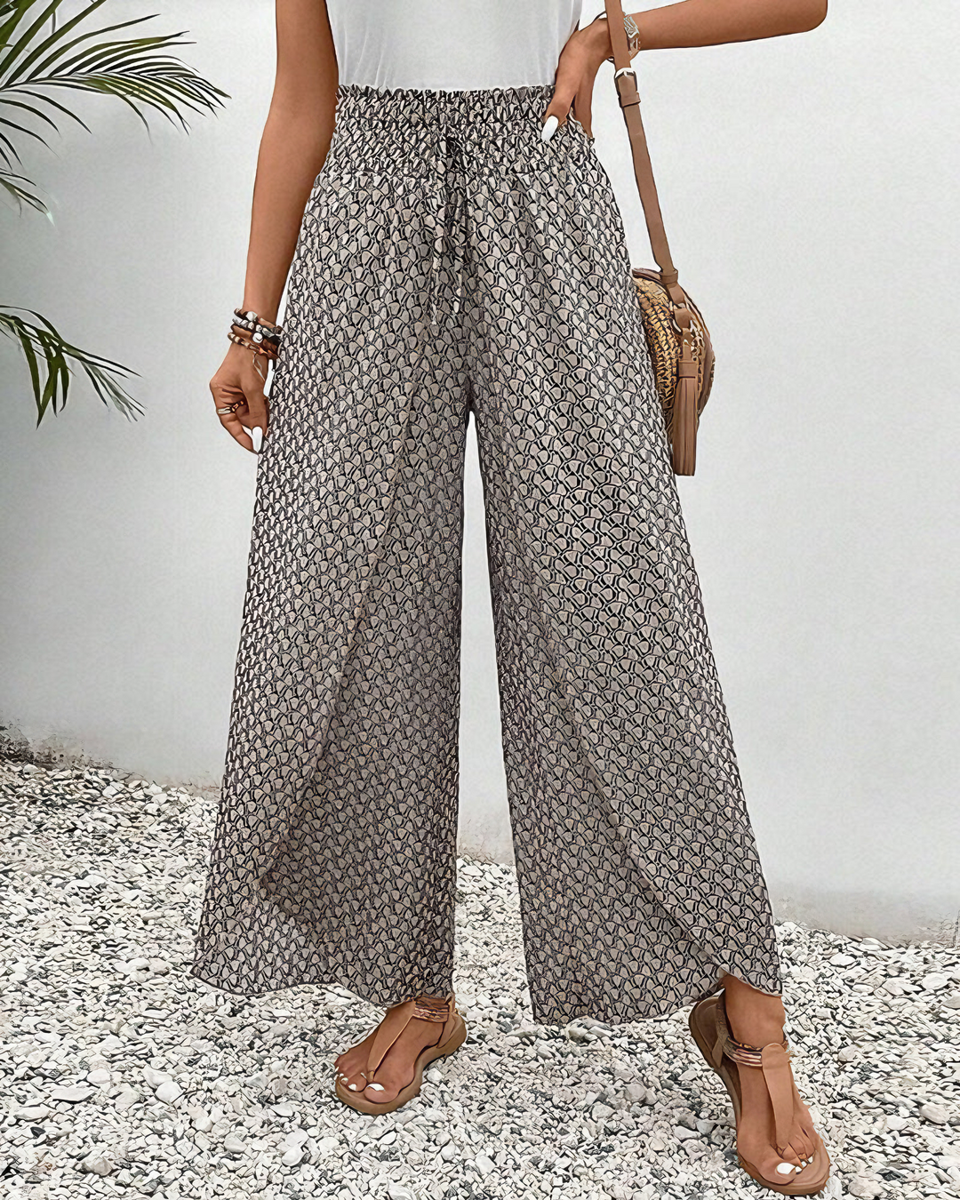 Women's effortless wide-leg pants in relaxed fit, perfect for comfortable lounge wear or casual chic summer outfits.