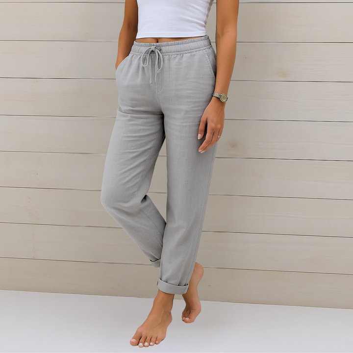 Soft women's straight leg pants with elastic waist and ankle length, designed for comfortable everyday wear.