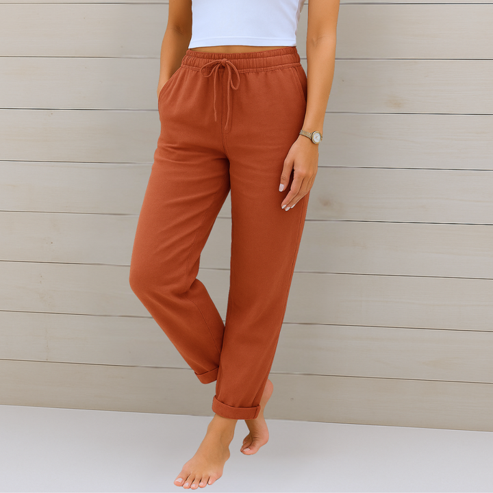 Women's ankle length straight leg drawstring pants, featuring an elastic waist for ultimate comfort & style.