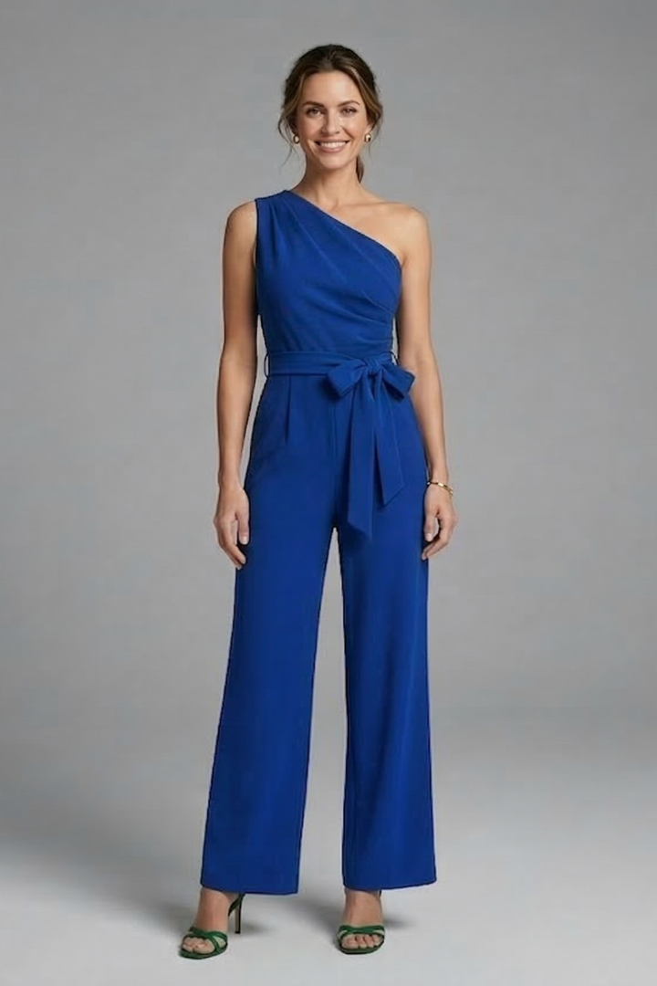 Modern fashion one-piece jumpsuit for women, asymmetric neck, wide leg, and stylish belt.