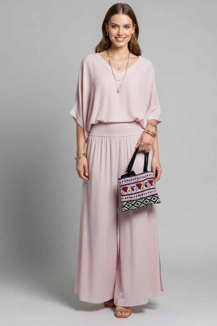 Women's fashion batwing top & wide leg pant set. An elegant two-piece for summer events and chic style.