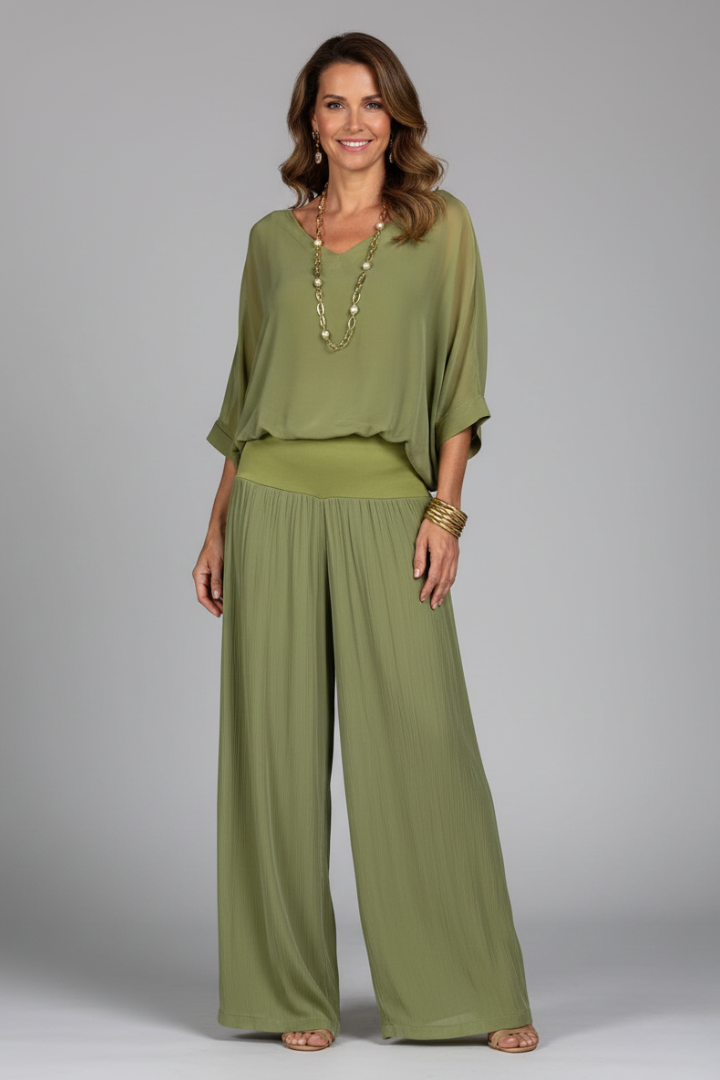 Chic women's two-piece set featuring a stylish batwing top & comfortable wide leg pants. Perfect for fashion.