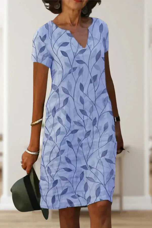 Purple elegant midi dress for women with a stylish belt. Perfect party wear and sophisticated occasion dress.