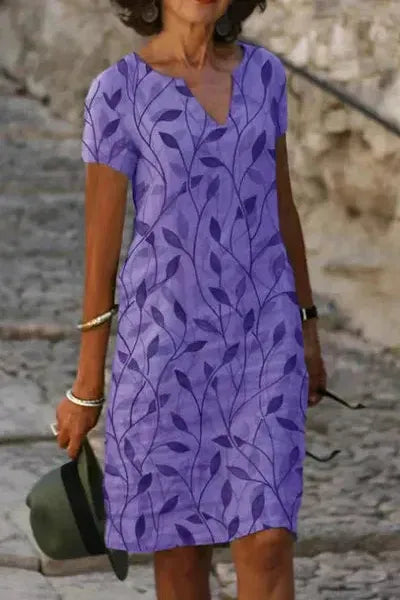 Versatile women's elegant midi dress with belt, suitable for office, parties, and special occasions.